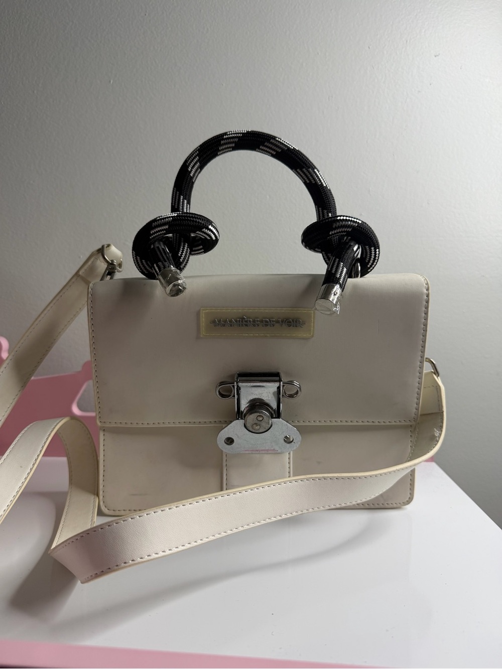 Maniere De Voir Cream Crossbody Satchel with Black Rope Top Handle
